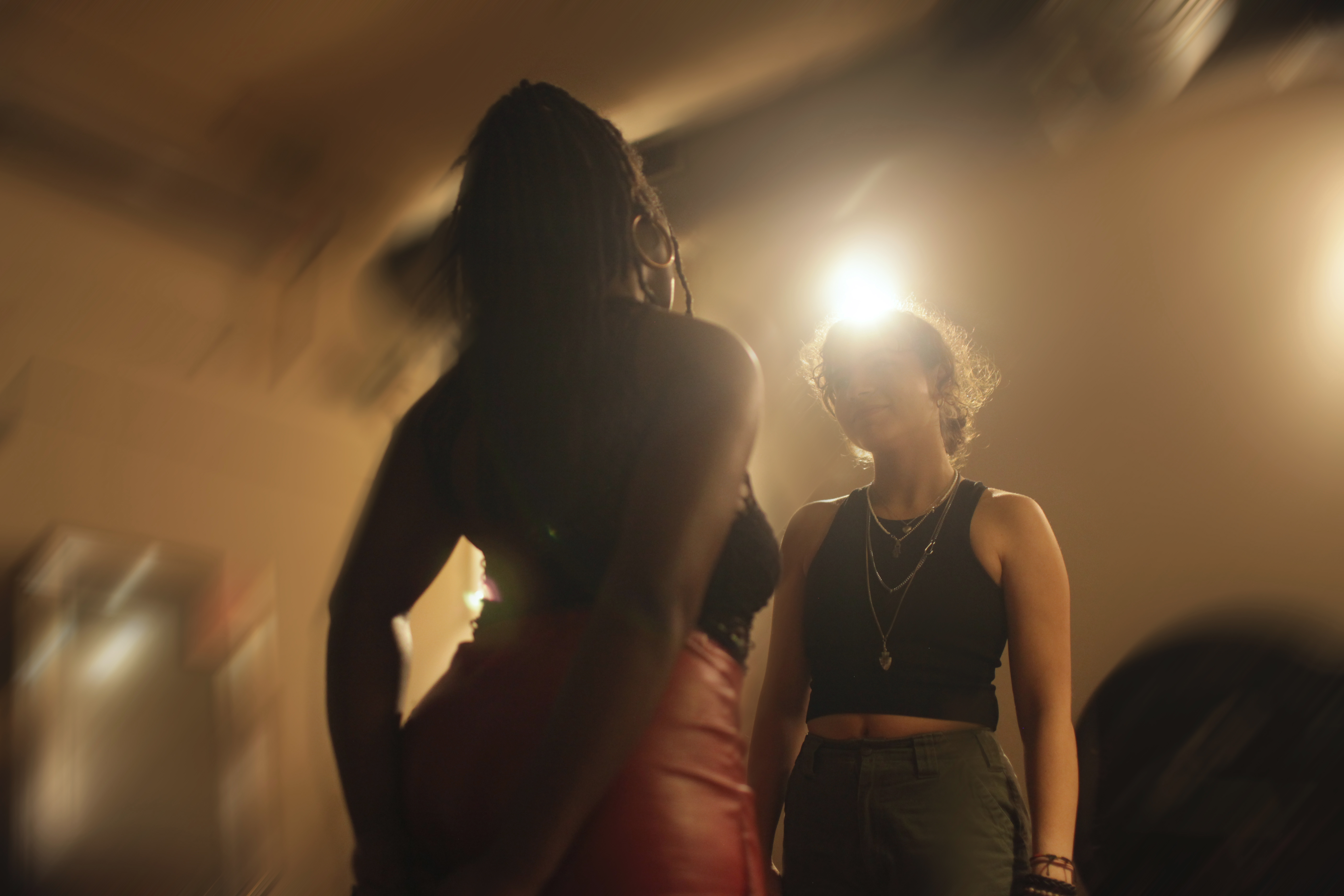 two people standing in front of each other